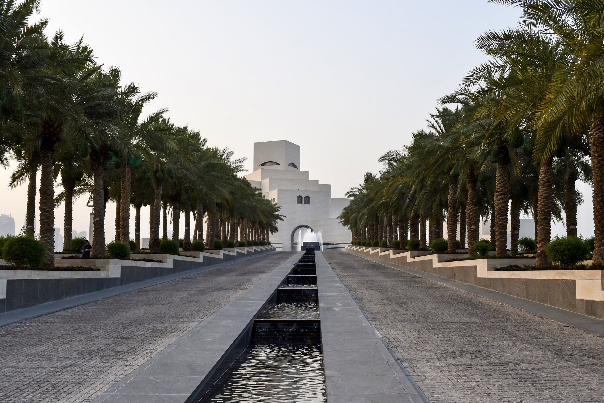 The Museum of Islamic Art in Doha, Qatar, designed by I.M. Pei and opened in 2008, built appropriately at the end of a long causeway on an artificial island in the Persian Gulf, just above the rising sea. Credit: Kesu01.