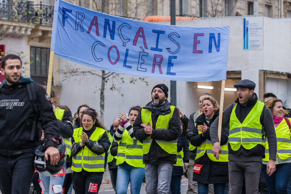 The French “Yellow Vest” movement (the vests are really green, but since the French are notorious contrarians, they’re called “yellow”) provides a preview of U.S. protests against raising gas prices enough to make a difference in carbon emissions.